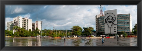 Framed Metal sculptures of Camilo Cienfuegos and Che Guevara on two buildings, Revolutionary Square, Vedado, Havana, Cuba Print