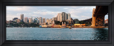 Framed Skyscrapers at the waterfront, McMahons Point, Sydney Harbor Bridge, Sydney Harbor, Sydney, New South Wales, Australia 2012 Print