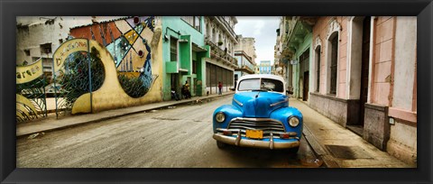 Framed Old car and a mural on a street, Havana, Cuba Print