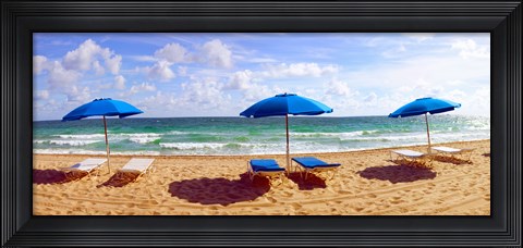 Framed Lounge chairs and beach umbrellas on the beach, Fort Lauderdale Beach, Florida, USA Print