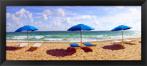 Framed Lounge chairs and beach umbrellas on the beach, Fort Lauderdale Beach, Florida, USA Print