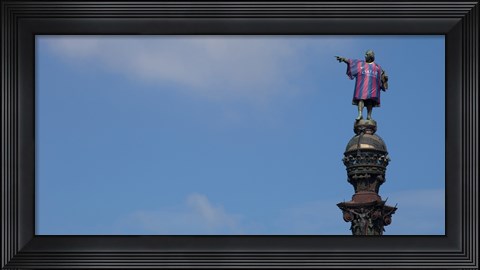 Framed Low angle view of a monument, Columbus Monument wearing soccer jersey, Barcelona, Catalonia, Spain Print