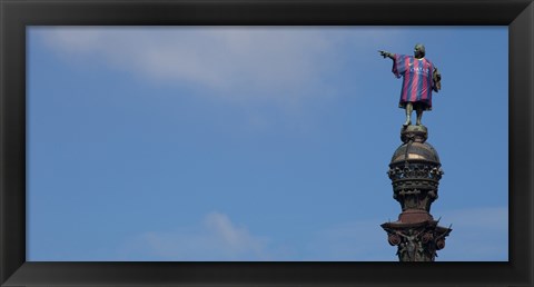 Framed Low angle view of a monument, Columbus Monument wearing soccer jersey, Barcelona, Catalonia, Spain Print