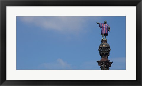 Framed Low angle view of a monument, Columbus Monument wearing soccer jersey, Barcelona, Catalonia, Spain Print