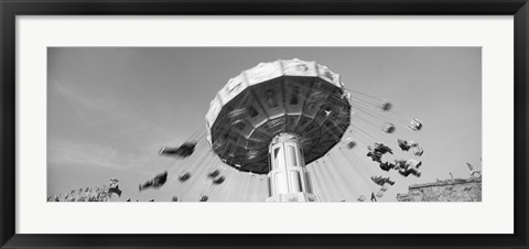 Framed Low angle view of people spinning on a carousel, Stuttgart, Baden-Wurttemberg, Germany Print