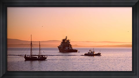 Framed Tugboat with a trawler and a tall ship in the Baie de Douarnenez at sunrise, Finistere, Brittany, France Print