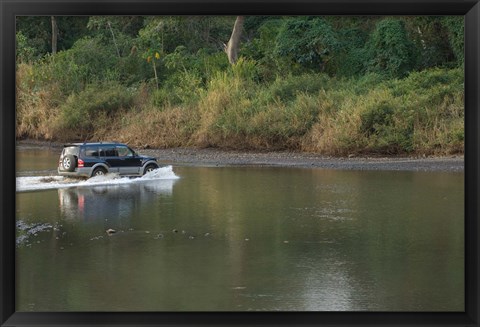 Framed Sports utility vehicle crossing a river, Ora River, Playa Carrillo, Guanacaste, Costa Rica Print