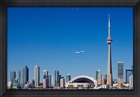 Framed Airplane over city skylines, CN Tower, Toronto, Ontario, Canada 2011 Print