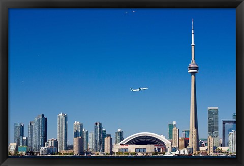 Framed Airplane over city skylines, CN Tower, Toronto, Ontario, Canada 2011 Print