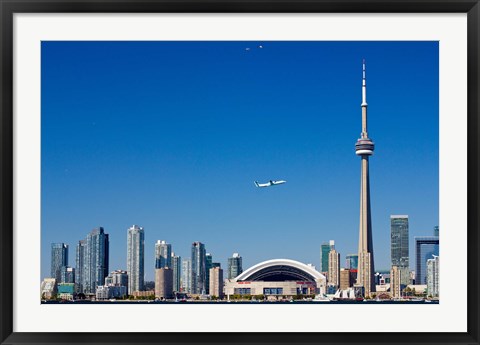 Framed Airplane over city skylines, CN Tower, Toronto, Ontario, Canada 2011 Print