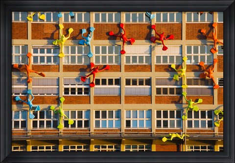 Framed Flossies Figures covering a Building, Medienhafen, Dusseldorf, North Rhine Westphalia, Germany Print