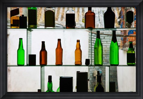 Framed Bottles displayed at foreigner bar, Old Town, Dali, Yunnan Province, China Print