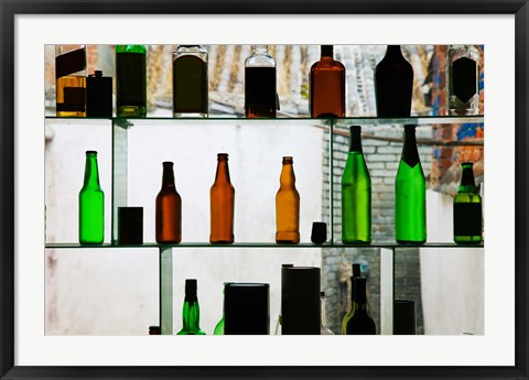 Framed Bottles displayed at foreigner bar, Old Town, Dali, Yunnan Province, China Print