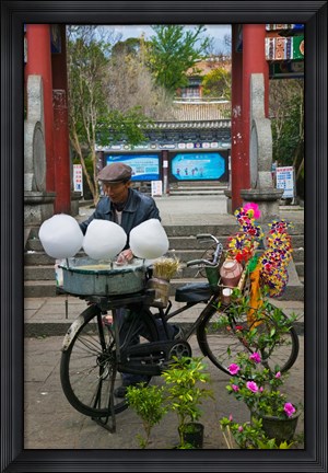 Framed Candy Floss Vendor selling Cotton Candies in Old Town Dali, Yunnan Province, China Print