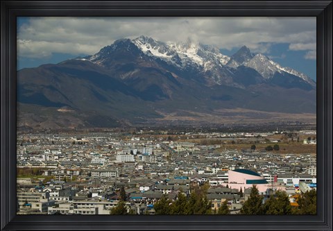 Framed High angle view of buildings in the new town towards Jade Dragon Snow Mountain, Lijiang, Yunnan Province, China Print
