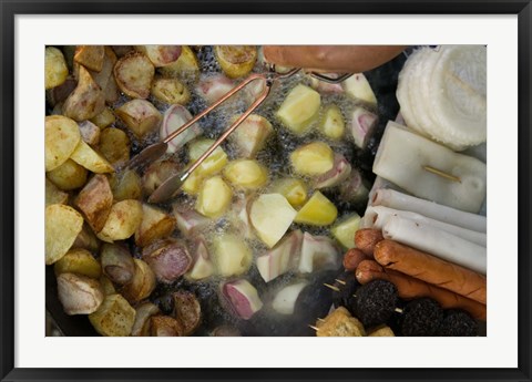 Framed Fried potatoes and snacks on the grill in a street market, Old Town, Lijiang, Yunnan Province, China Print