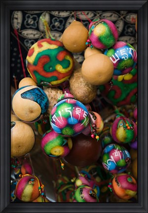 Framed Painted gourds for sale in a street market, Old Town, Lijiang, Yunnan Province, China Print