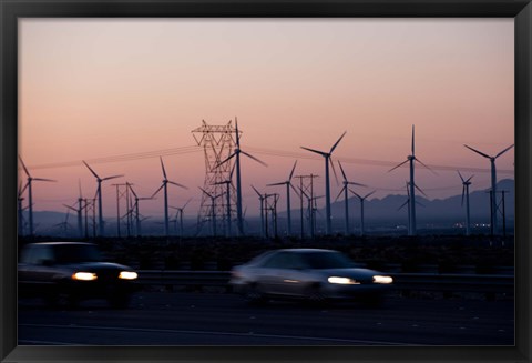 Framed Cars moving on road with wind turbines in background at dusk, Palm Springs, Riverside County, California, USA Print