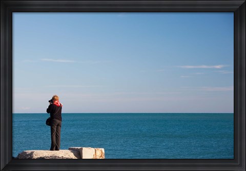 Framed Woman photographing with a camera at Le Cap d&#39; Agde, Herault, Languedoc-Roussillon, France Print