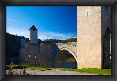 Framed Medieval bridge across a river, Pont Valentre, Lot River, Cahors, Lot, Midi-Pyrenees, France Print