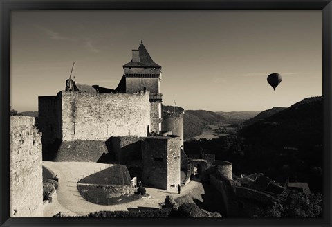 Framed Chateau de Castelnaud with hot air balloon flying over a valley, Castelnaud-la-Chapelle, Dordogne, Aquitaine, France Print