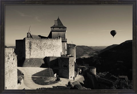 Framed Chateau de Castelnaud with hot air balloon flying over a valley, Castelnaud-la-Chapelle, Dordogne, Aquitaine, France Print