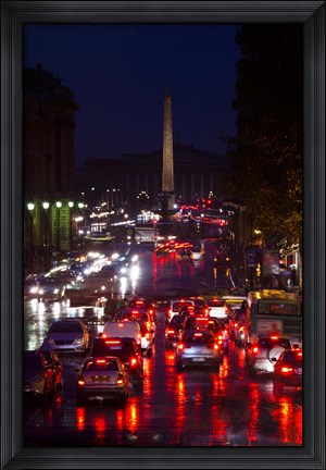 Framed Elevated view of traffic on the road at night viewed from Eglise Madeleine church, Rue Royale, Paris, Ile-de-France, France Print