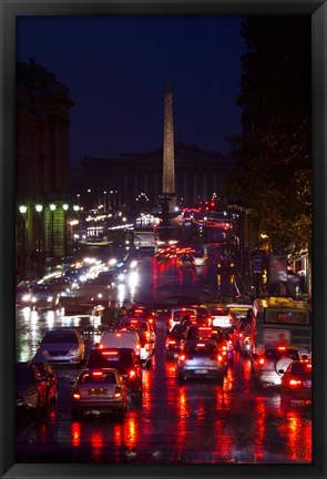 Framed Elevated view of traffic on the road at night viewed from Eglise Madeleine church, Rue Royale, Paris, Ile-de-France, France Print