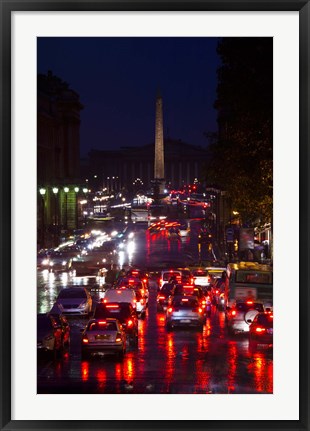 Framed Elevated view of traffic on the road at night viewed from Eglise Madeleine church, Rue Royale, Paris, Ile-de-France, France Print