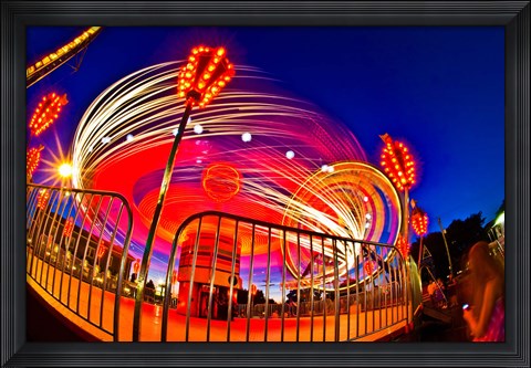 Framed Time exposure of a Carnival ride at night Print