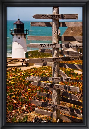 Framed Directional signs on a pole with light house in the background, Point Montara Lighthouse, Montara, California, USA Print