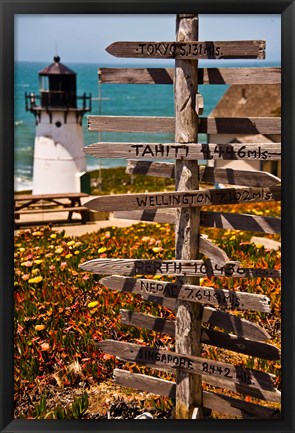 Framed Directional signs on a pole with light house in the background, Point Montara Lighthouse, Montara, California, USA Print