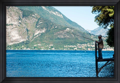 Framed Man Fishing from Dock on Edge of Lake Como, Varenna, Lombardy, Italy Print