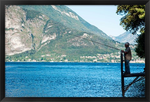 Framed Man Fishing from Dock on Edge of Lake Como, Varenna, Lombardy, Italy Print