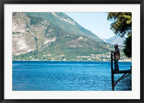 Framed Man Fishing from Dock on Edge of Lake Como, Varenna, Lombardy, Italy Print