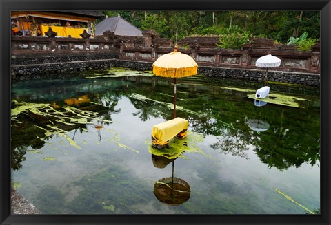 Framed Covered stones with umbrella in ritual pool at holy spring temple, Tirta Empul Temple, Tampaksiring, Bali, Indonesia Print