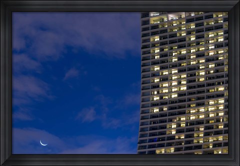 Framed Low angle view of a shopping centre with crescent moon at dusk, Marina Bay Sands, Singapore Print