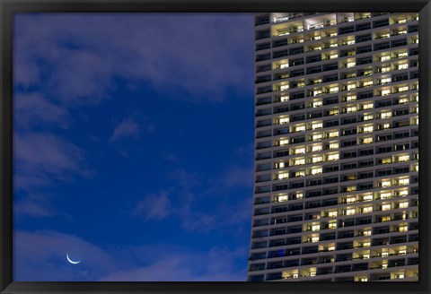 Framed Low angle view of a shopping centre with crescent moon at dusk, Marina Bay Sands, Singapore Print