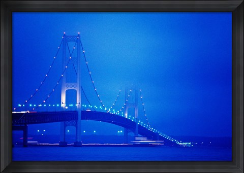 Framed Fog surrounding the Mackinac Bridge at dusk, Michigan, USA Print
