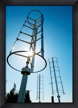 Framed Low angle view of vertical windmills Print