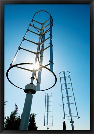 Framed Low angle view of vertical windmills Print