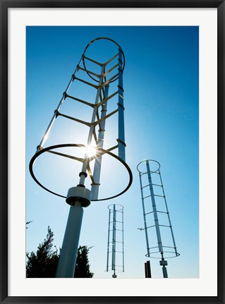 Framed Low angle view of vertical windmills Print