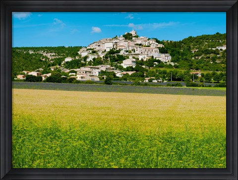 Framed Farm with a town in the background, Simiane-La-Rotonde, Alpes-de-Haute-Provence, Provence-Alpes-Cote d&#39;Azur, France Print