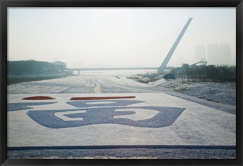 Framed Songhuajiang Highway Bridge across the frozen Songhua River, Harbin, China Print