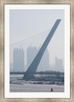 Framed Songhuajiang Highway Bridge across the frozen Songhua River with buildings in the background, Harbin, China Print