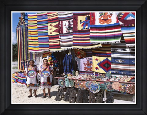 Framed Two female vendors dressed in Mayan costumes displaying products Print