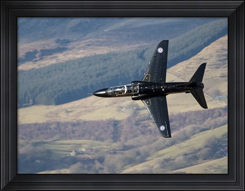 Framed Hawk T1 trainer aircraft of the Royal Air Force low flying over North Wales Print