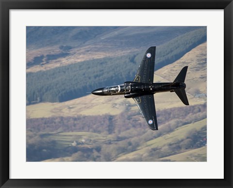 Framed Hawk T1 trainer aircraft of the Royal Air Force low flying over North Wales Print