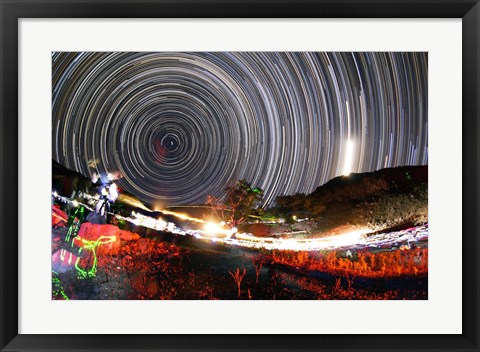 Framed Astronomers observe polar star trails above a mountain in Iran Print