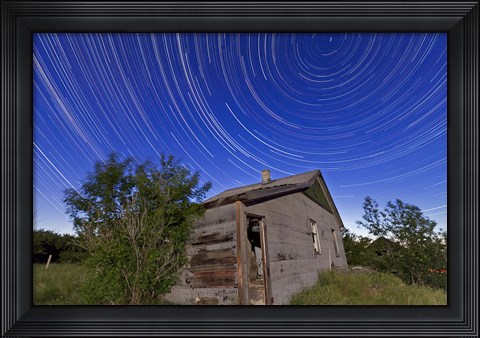 Framed Circumpolar star trails above an old farmhouse in Alberta, Canada Print